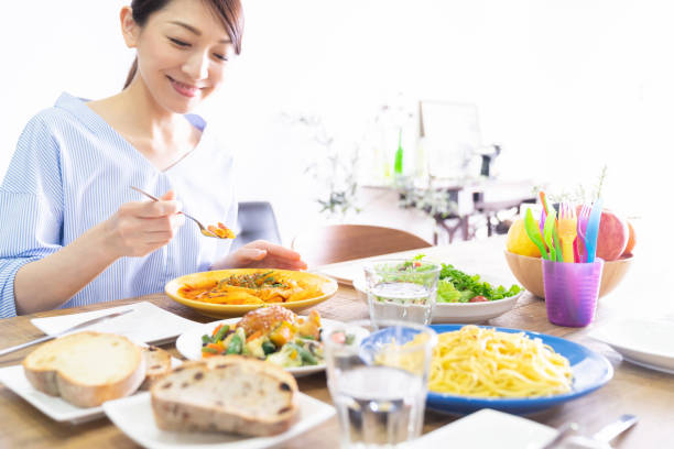 istock asian woman who eats 1292662254