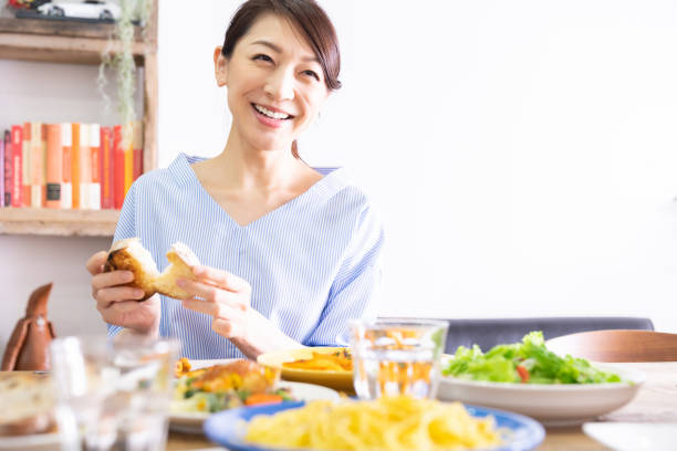 istock asian woman who eats 1292662310