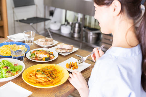 istock asian woman who eats 1292662378