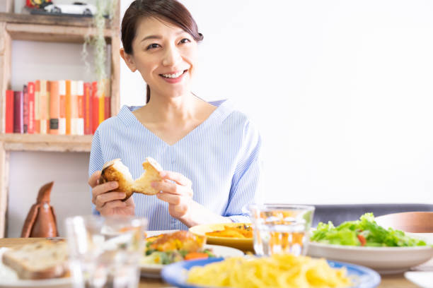 istock asian woman who eats 1292662395