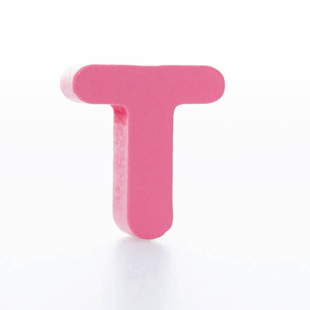 istock Wooden letter T on white background 1292662518