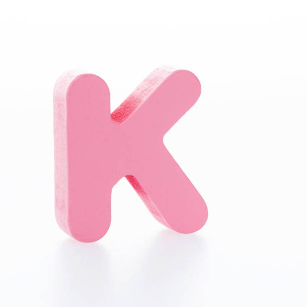 istock Wooden letter K on white background 1292662521