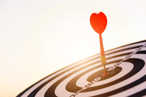 istock dart arrow hit center on Bullseye 1292664052