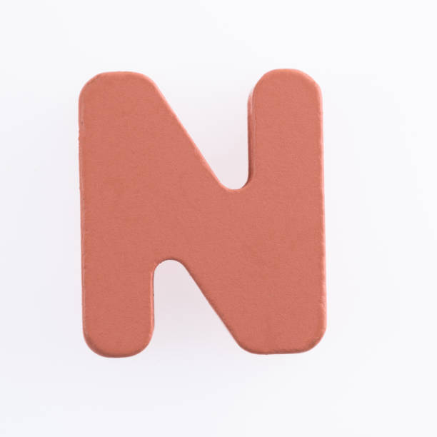 istock Wooden letter N on white background 1292664636