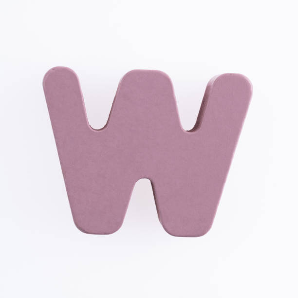 istock Wooden letter W on white background 1292664680