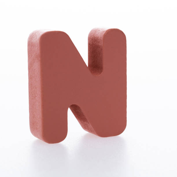 istock Wooden letter N on white background 1292664774