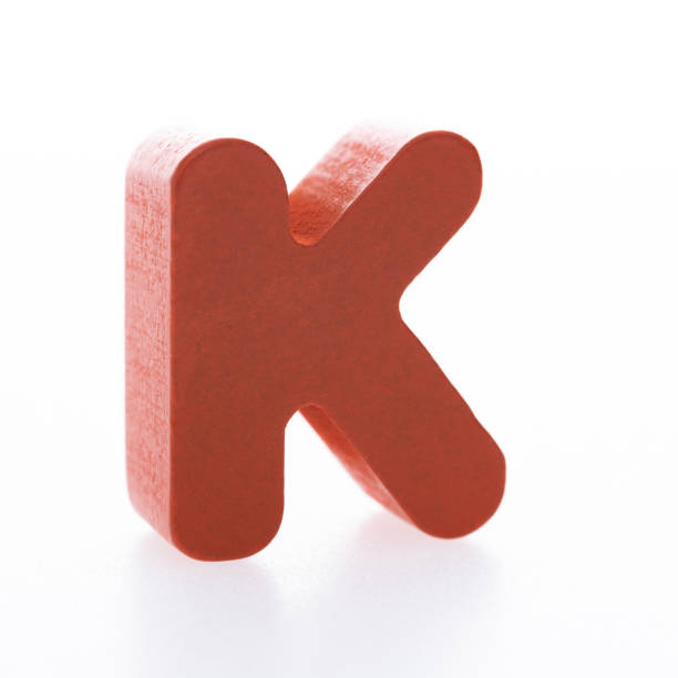 istock Wooden letter K on white background 1292664928