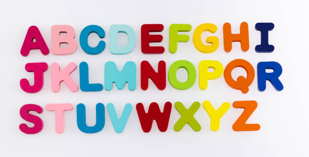istock Wooden alphabet blocks on white background 1292665594
