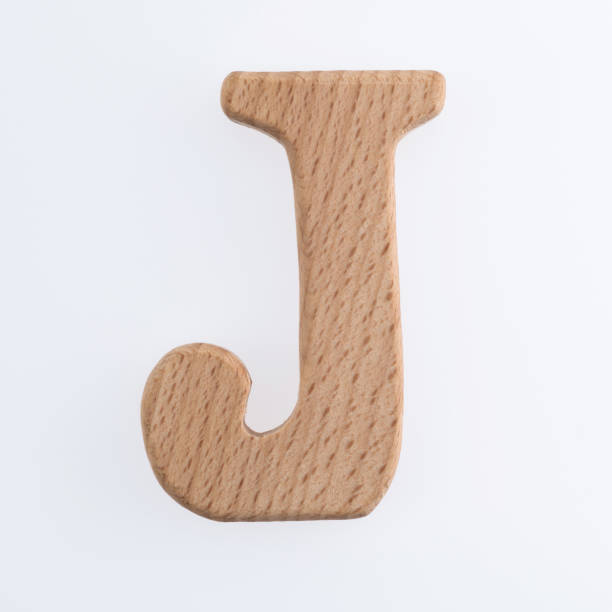 wooden letter j on white background - letter j block toy alphabet imagens e fotografias de stock