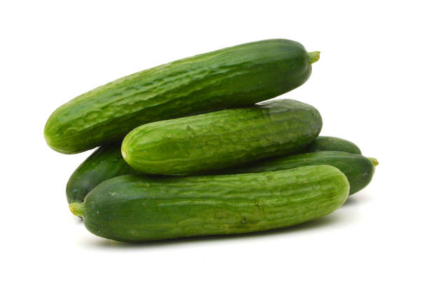 istock Sliced cucumber vegetable isolated on white background cutout 1292668033