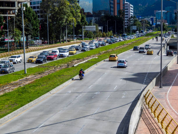 istock Two-lane multi-lane avenue with cars (Calle 92 Bogotá) 1292669192