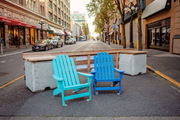 Victoria, Canada - October 30, 2020. Outdoor seating expands into the street to encourage social distancing during the COVID-19 pandemic.