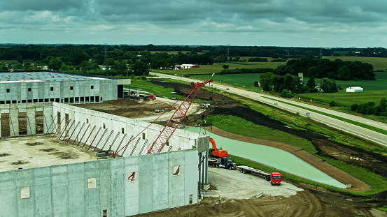 Aerial view of a distribution center being constructed by the side of Interstate 41 on the edge of Kenosha, Wisconsin.