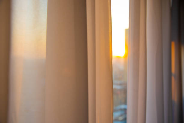 istock Window curtain in the morning 1292675422