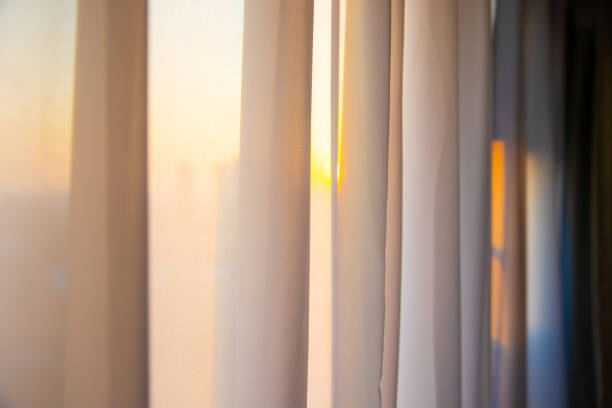 istock Window curtain in the morning 1292675447