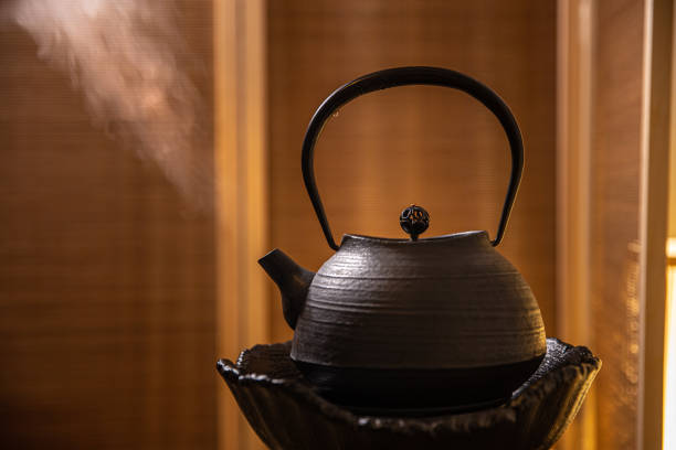 istock Chinese tea preparing,Teapot with steam 1292675669