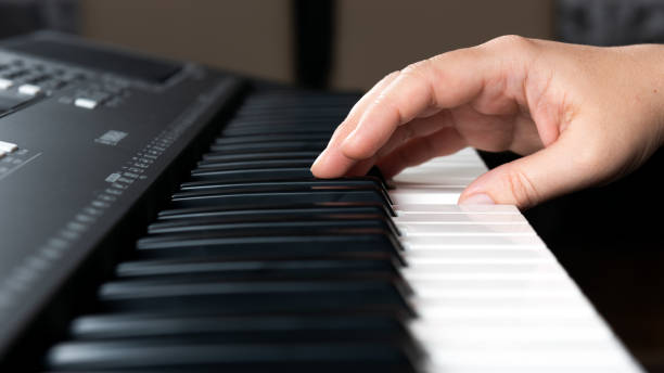 istock Musician at a concert playing piano 1292676653