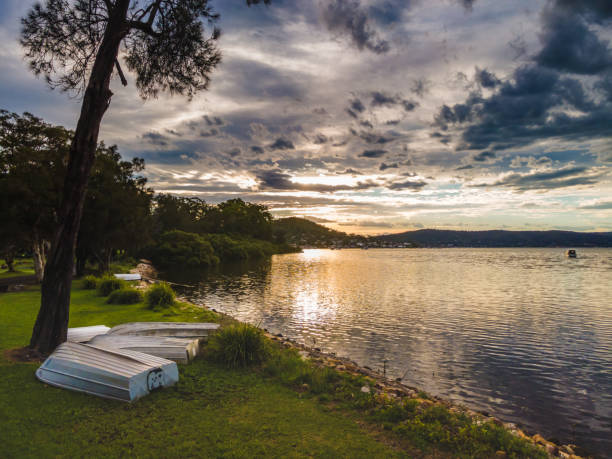 istock Sunset and clouds over the water 1292679338