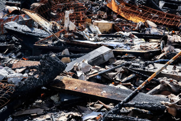 istock Logs from a burnt house, place after a fire 1292685526