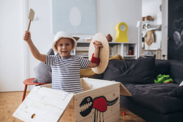 istock kids playing at home 1292688401