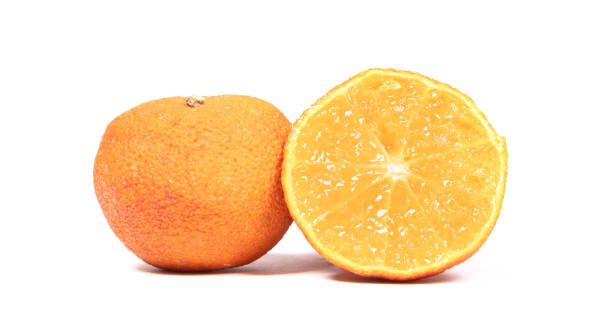 istock Ordinary old and dry mandarin, isolated on white 1292691226