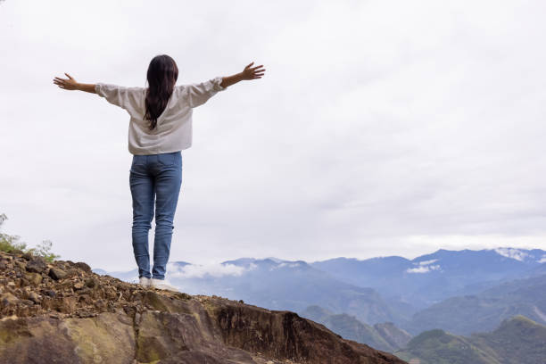 istock traveler look cloudy mountain 1292692603