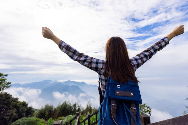 istock traveler look cloudy mountain 1292692635