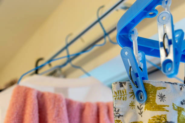 istock Hanging laundry on the curtain rail in the room 1292697385