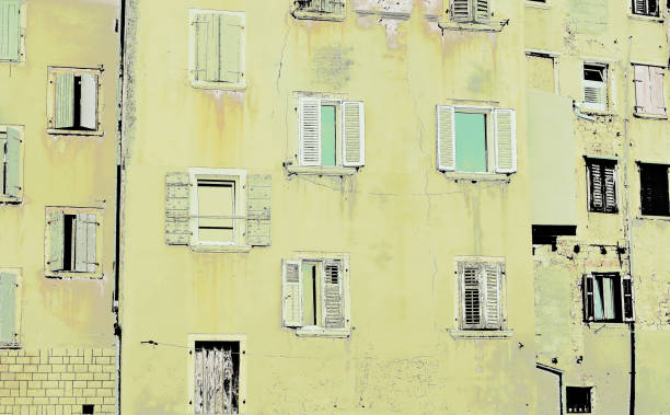 istock an old yellow building with open balconies 1292700778
