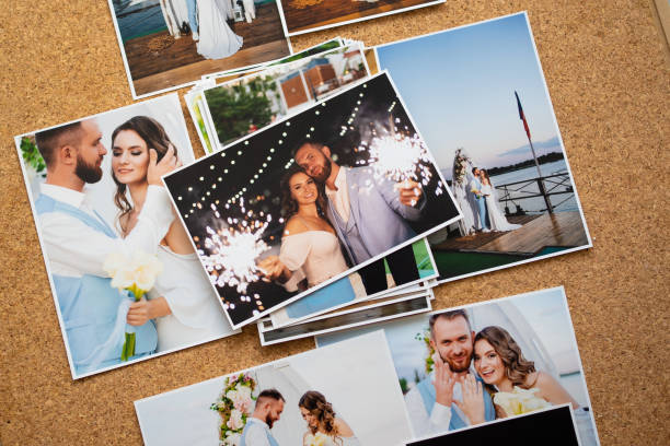 a printed copy of the wedding photos. the result of a photo session a printed copy of the wedding photos. the result of a photo session of the bride and groom. artists canvas photos stock pictures, royalty-free photos & images