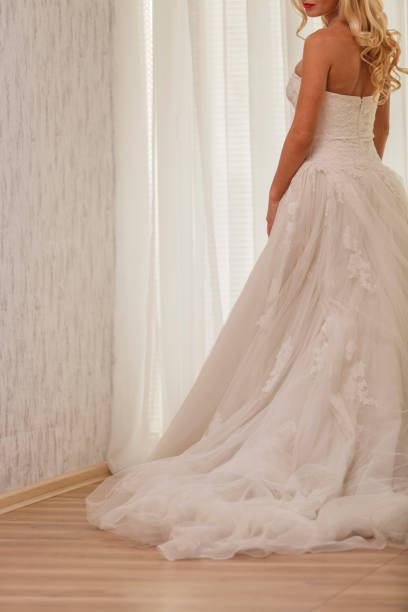 istock Blond haired bride in a beautiful wedding dress 1292702175