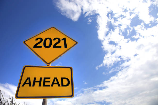 istock Road sign to 2021 1292702963