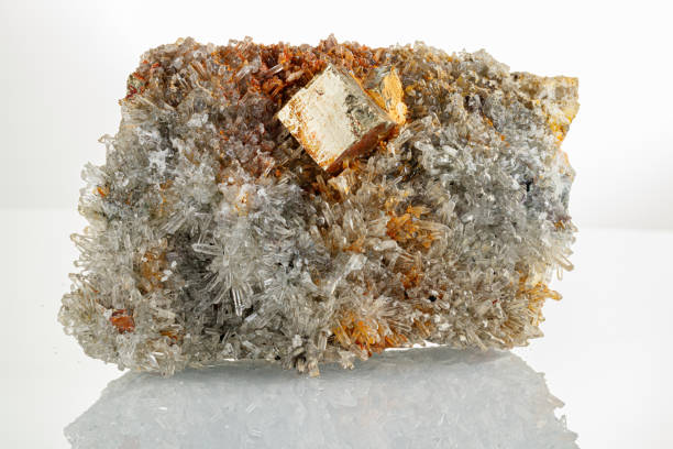 istock macro mineral stone Quartz Pyrite on a white background 1292703213