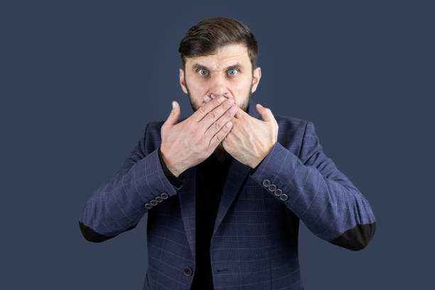 istock a man with a beard a businessman in a blue suit 1292703467