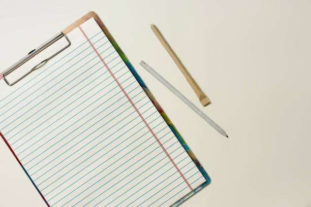 istock Pencils and paper sheet from recycled materials 1292703739