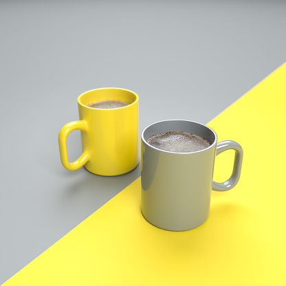Two pots of freshly brewed coffee in yellow and grey. Both colors also used on the split surface area.