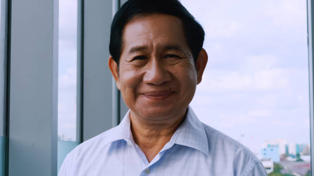 istock Portrait of smiling senior man. 1292712247