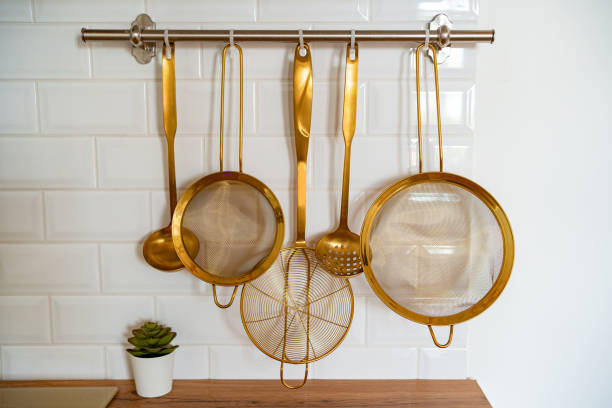 istock kitchen utensils in gold color. storage in the kitchen. 1292712509