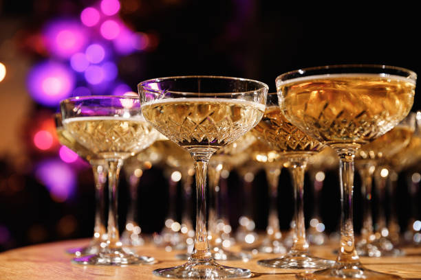 istock Glasses with champagne at an event, celebration, party 1292712638