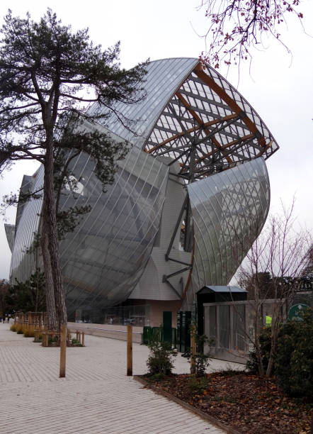 The L.Vuitton foundation, Paris, France Paris, France - December 10, 2015 The Louis Vuitton Foundation building is an art museum and cultural center. It was opened in 2014. The building was designed by architect Frank Gehry. frank gehry building stock pictures, royalty-free photos & images