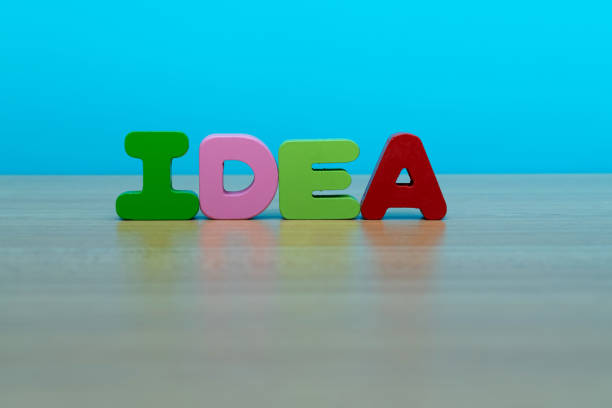 istock Wooden word idea on the table 1292715156