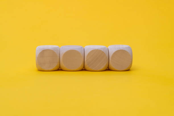 Stack of two die (dice) showing the lucky number six.  With copy space