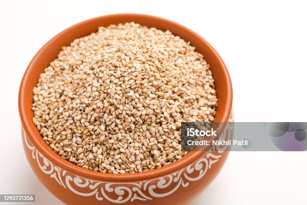 Sesame Seed In Bowl On White Background Stock Photo - Download Image Now - Makar Sankranti, Agriculture, Asia