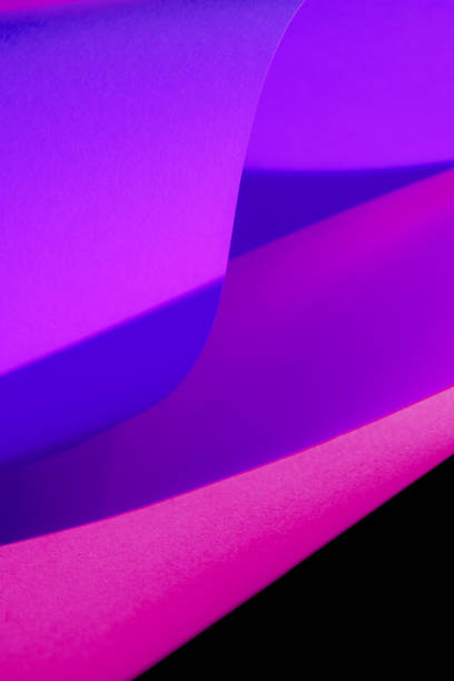 istock Abstract colorful background made of bent paper. 1292721522