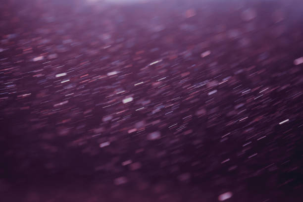 istock Festive purple illuminating background, blurred motion effect 1292722527