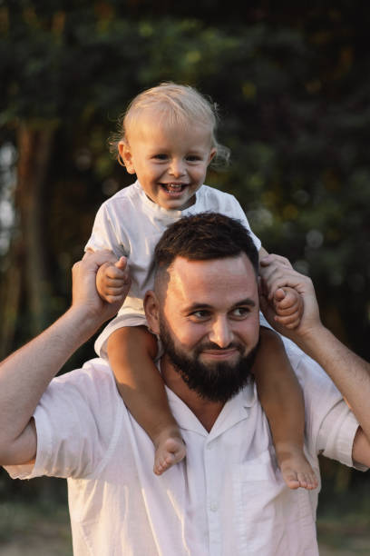 istock Happy family spends time in nature. 1292723041