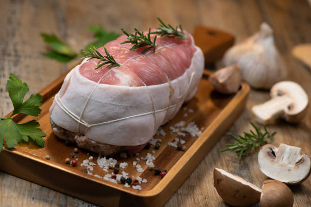 istock Raw veal meat on wood background 1292723766