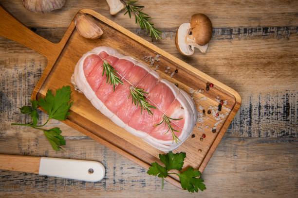 istock Raw veal meat on wood background 1292723798