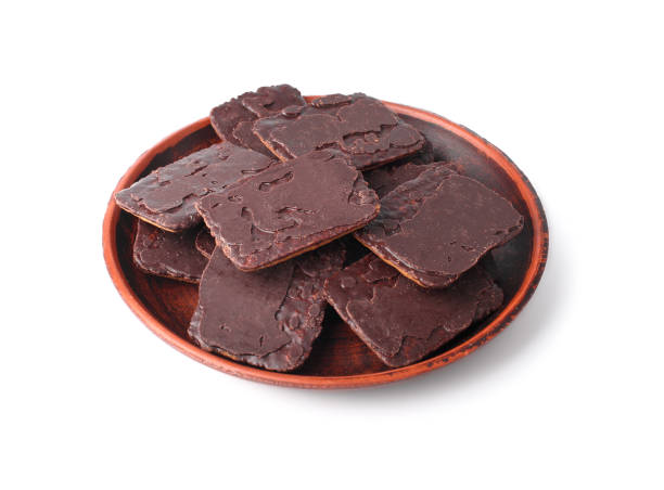 istock Chocolate chip cookie on a saucer on white isolated background with clipping path 1292724949