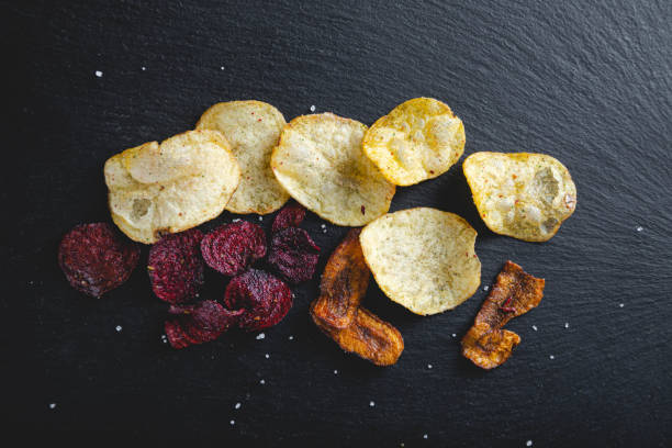 istock Vegetable chips made from potatoes, beets, carrots 1292725116